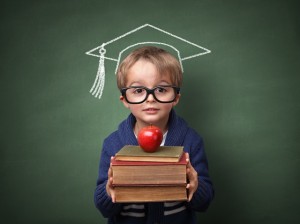 Child holding stack of books